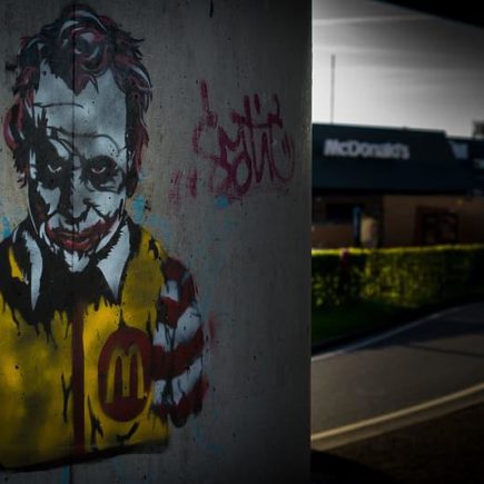 A Ronald McDonald meets Joker from Batman graffiti